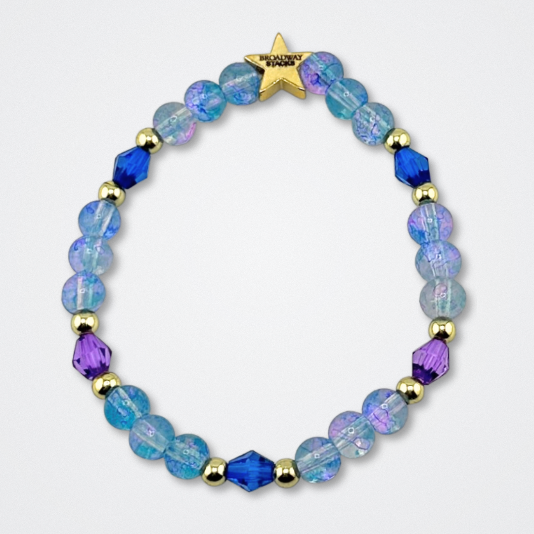 Broadway Stacks theatre-themed bracelet inspired by The Notebook Musical. Blue and purple beads on a gray background. Signature star bead to remind you that You Shine!