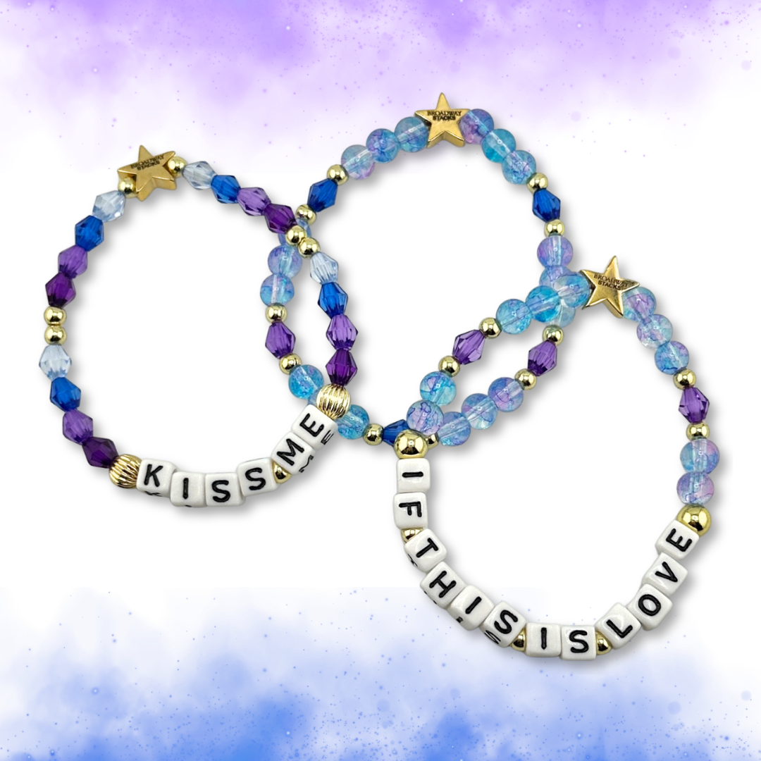 Broadway Stacks theatre-themed bracelets inspired by The Notebook Musical. Quotes on bracelets with blue and purple beads on a watercolor background. Part of the My DAYS Collection.