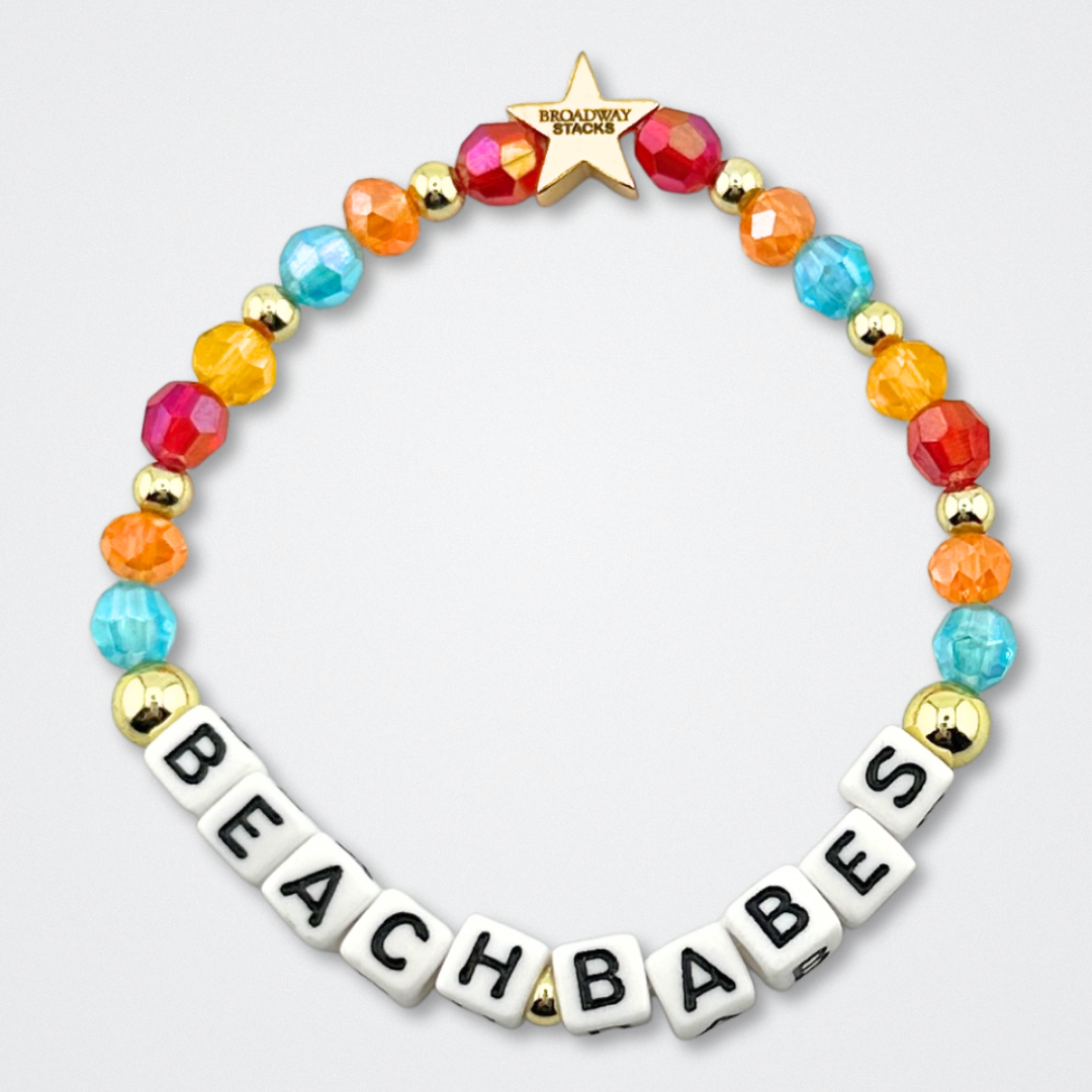 Broadway Stacks BETTER TOGETHER Collection. 5 stretch bracelets included in Stack. Black, white, red, blue, orange, yellow and gold colored beads. Letter beads that spell quotes. Star logo bead to remind you that you shine. Beaches the Musical fans.