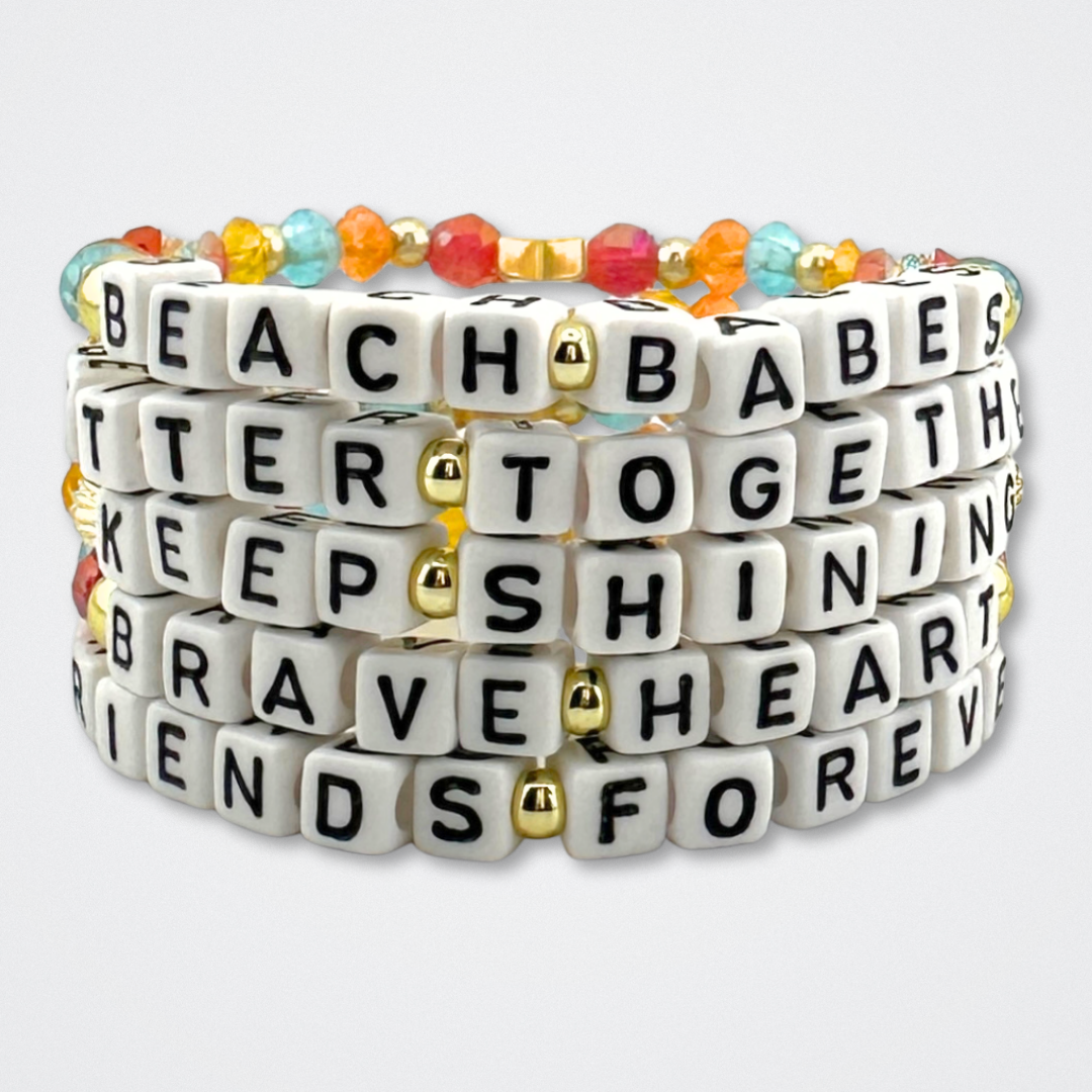 Broadway Stacks BETTER TOGETHER Collection. 5 stretch bracelets included in Stack. Black, white, red, blue, orange, yellow and gold colored beads. Letter beads that spell quotes. Star logo bead to remind you that you shine. Beaches the Musical fans.