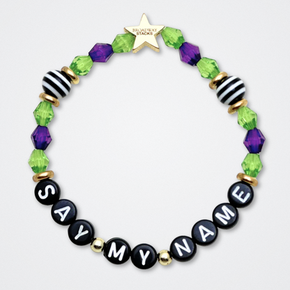 Broadway Stacks NETHERWORLD Collection. 5 stretch bracelets included in Stack. Green, black, purple, striped and gold colored beads. Letter beads that spell quotes. Gold star logo bead to remind you that You Shine. Beetlejuice fans. 