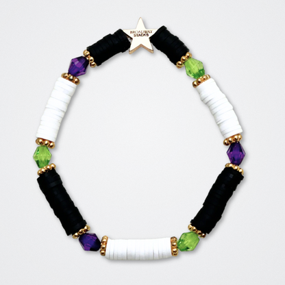 Broadway Stacks NETHERWORLD Collection. 5 stretch bracelets included in Stack. Green, black, purple, striped and gold colored beads. Letter beads that spell quotes. Gold star logo bead to remind you that You Shine. Beetlejuice fans. 