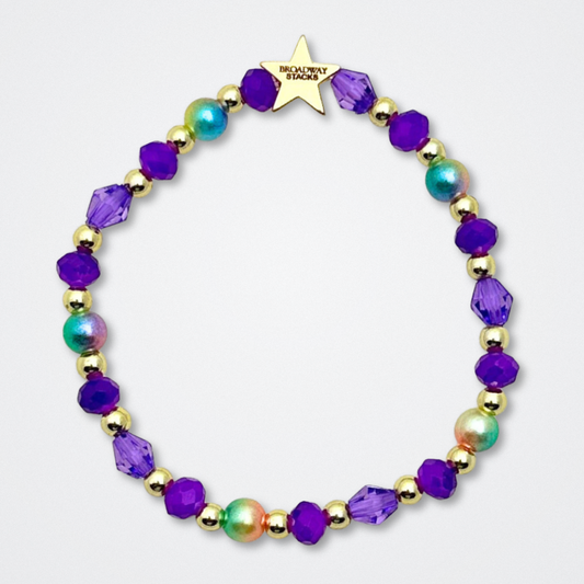 Broadway Stacks BroadwayCon X 2025 Special Edition bracelet. Stack of 3 bracelets. Purple, gold and iridescent colored beads. Letter beads that spell Bway Con X.