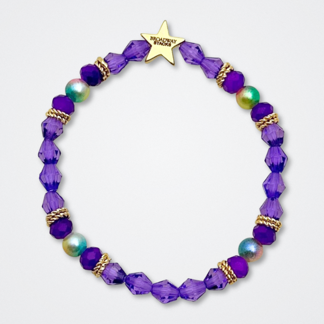 Broadway Stacks BroadwayCon X 2025 Special Edition bracelet. Stack of 3 bracelets. Purple, gold and iridescent colored beads. Letter beads that spell Bway Con X.