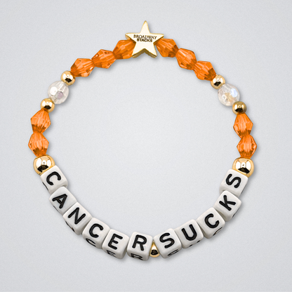 Broadway Stacks Special Edition bracelet. Red, pink, orange, yellow, green, blue. purple, white and gold beads. Letter beads that spell Cancer Sucks. Helping the Broadway Husbands and their fight with Lymphoma cancer. Star logo bead to remind you that you shine.