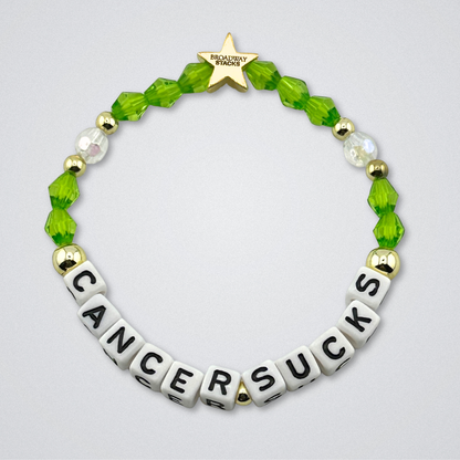 Broadway Stacks Special Edition bracelet. Red, pink, orange, yellow, green, blue. purple, white and gold beads. Letter beads that spell Cancer Sucks. Helping the Broadway Husbands and their fight with Lymphoma cancer. Star logo bead to remind you that you shine.