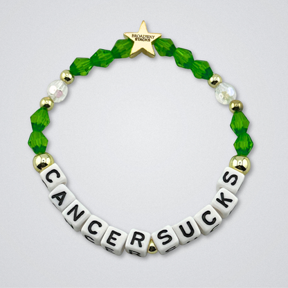 Broadway Stacks Special Edition bracelet. Red, pink, orange, yellow, green, blue. purple, white and gold beads. Letter beads that spell Cancer Sucks. Helping the Broadway Husbands and their fight with Lymphoma cancer. Star logo bead to remind you that you shine.