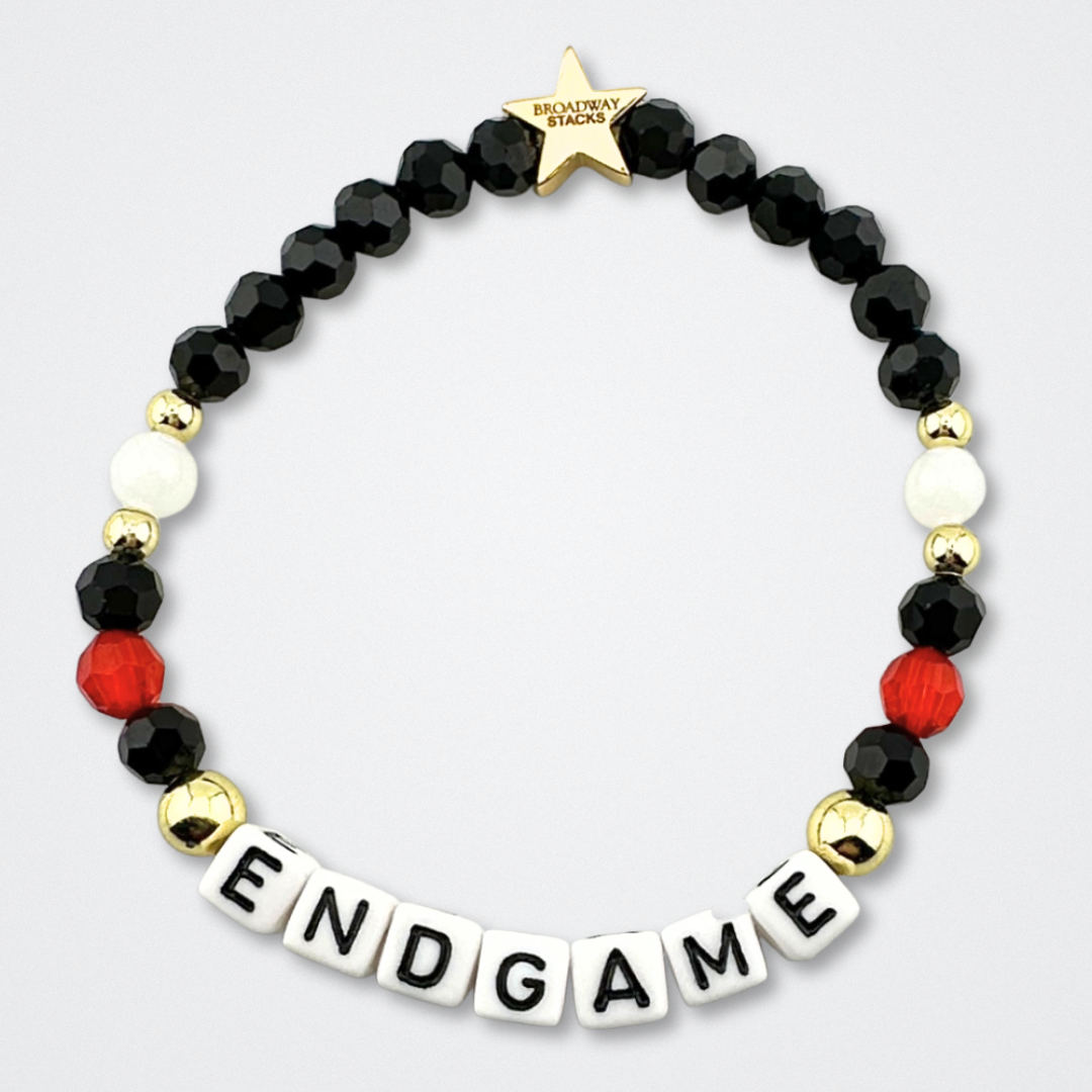 Broadway Stacks CHECKMATE Collection. 5 stretch bracelets included in Stack. Black, white, red, pink and gold colored beads. Letter beads that spell quotes. Star logo bead to remind you that you shine. Chess the Musical fans.