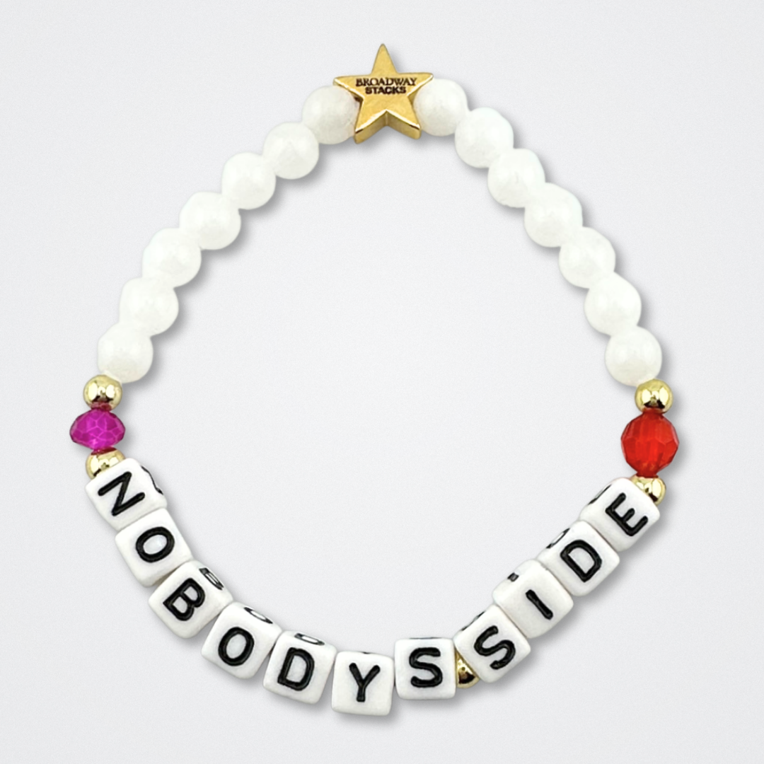 Broadway Stacks CHECKMATE Collection. 5 stretch bracelets included in Stack. Black, white, red, pink and gold colored beads. Letter beads that spell quotes. Star logo bead to remind you that you shine. Chess the Musical fans.