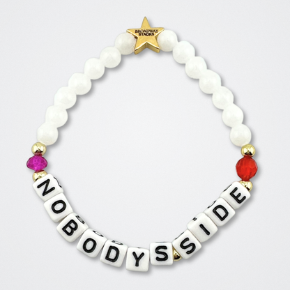 Broadway Stacks CHECKMATE Collection. 5 stretch bracelets included in Stack. Black, white, red, pink and gold colored beads. Letter beads that spell quotes. Star logo bead to remind you that you shine. Chess the Musical fans.