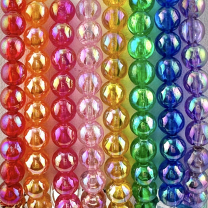Colorful beads arranged in a rainbow pattern. Colors available for Broadway Stacks SPOTLIGHT Collection and CUSTOM TEXT. 