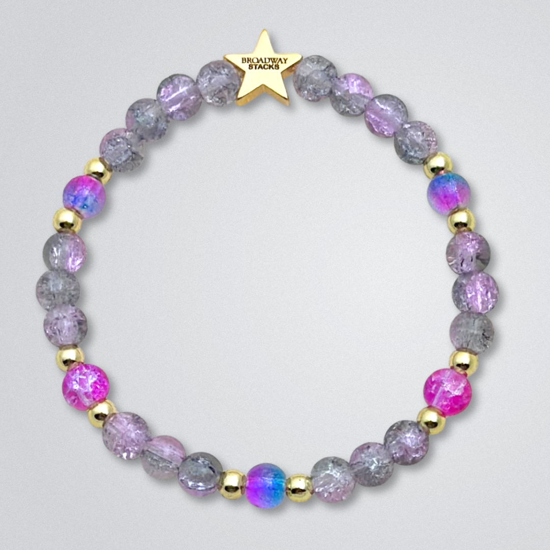 Broadway Stacks SIEMPRE VIVA Collection. 5 stretch bracelets included in Stack. Purple, blue, green, yellow, orange, red and gold colored beads. Letter beads that spell quotes. Gold star logo bead to remind you that you shine. Death Becomes Her fans.