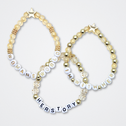 Broadway Stacks EmpowHER bracelet collection. Gold, glitter and letter beads that spell out quotes. Gold star logo bead to remind yourself that You Shine. Self-empowerment inspiration reminders.