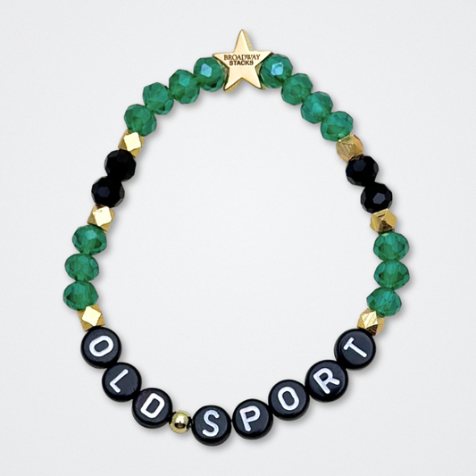 Broadway Stacks NEW MONEY Collection. 5 stretch bracelets included in Stack. Teal, green, black and gold colored beads. Letter beads that spell quotes. Gold star logo bead to remind you that You Shine. Great Gatsby fans.