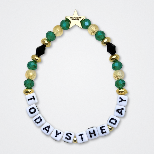Broadway Stacks NEW MONEY Collection. 5 stretch bracelets included in Stack. Teal, green, black and gold colored beads. Letter beads that spell quotes. Gold star logo bead to remind you that You Shine. Great Gatsby fans.