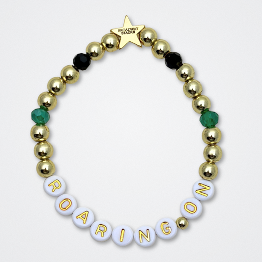 Broadway Stacks NEW MONEY Collection. 5 stretch bracelets included in Stack. Teal, green, black and gold colored beads. Letter beads that spell quotes. Gold star logo bead to remind you that You Shine. Great Gatsby fans.