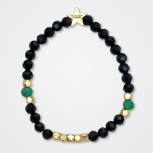 Broadway Stacks NEW MONEY Collection. 5 stretch bracelets included in Stack. Teal, green, black and gold colored beads. Letter beads that spell quotes. Gold star logo bead to remind you that You Shine. Great Gatsby fans.