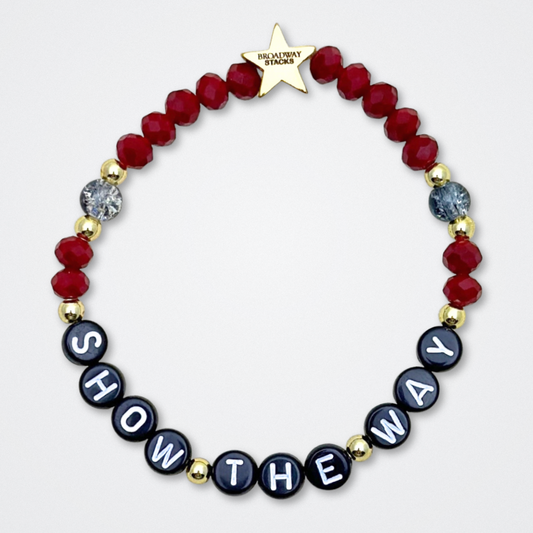 Broadway Stacks UNDERWORLD collection. 5 stretch bracelets included in Stack. Red, garnet, black and gold colored beads. Letter beads that spell quotes. Gold star logo bead to remind you that you shine. Hadestown fans.