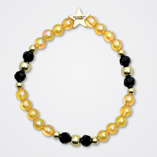 Broadway Stacks REVOLUTION Collection. 5 stretch bracelets included in Stack. Yellow, white, black and gold colored beads. Letter beads that spell quotes. Gold star logo bead to remind you that You Shine. Hamilton the Musical fans. 