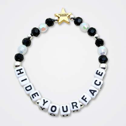 Broadway Stacks MASQUERADE Collection. 4 stretch bracelets included in Stack. Black, white and silver colored beads. Letter beads that spell quotes. Gold star logo bead to remind you that you shine. Phantom of the Opera and Masquerade NYC fans.