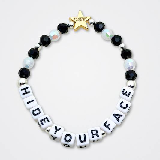 Broadway Stacks MASQUERADE Collection. 4 stretch bracelets included in Stack. Black, white and silver colored beads. Letter beads that spell quotes. Gold star logo bead to remind you that you shine. Phantom of the Opera and Masquerade NYC fans.