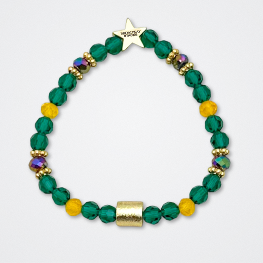Broadway Stacks STAY GOLD collection. Stretch bracelets included in Stack. Gold, yellow, green and grey colored beads. Letter beads that have show quote or name. Broadway Stacks gold star logo bead to remind you that You Shine. The Outsiders the Musical fans.