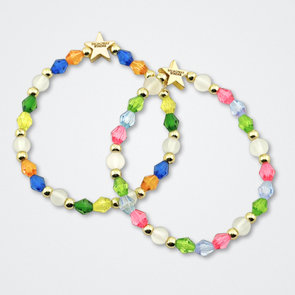Broadway Stacks STAY GOLD collection. Stretch bracelets included in Stack. Inspired by characters from The Outsiders the Musical. Greasers and Socs. Broadway Stacks gold star logo bead to remind you that You Shine!