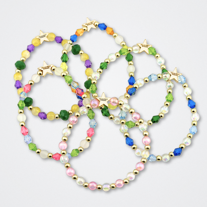 Broadway Stacks STAY GOLD collection. Stretch bracelets included in Stack. Inspired by characters from The Outsiders the Musical. Greasers and Socs. Broadway Stacks gold star logo bead to remind you that You Shine!