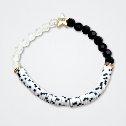 Broadway Stacks MASK collection. Bead bracelets included in Stack. Red, black, white and gold colored beads. Letter beads that spell quotes. Team Phantom, Team Christine, Team Raoul. Gold star logo bead to remind you that You Shine. Phantom of the Opera and Masquerade fans.