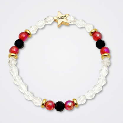 Broadway Stacks MASK collection. Bead bracelets included in Stack. Red, black, white and gold colored beads. Letter beads that spell quotes. Team Phantom, Team Christine, Team Raoul. Gold star logo bead to remind you that You Shine. Phantom of the Opera and Masquerade fans.