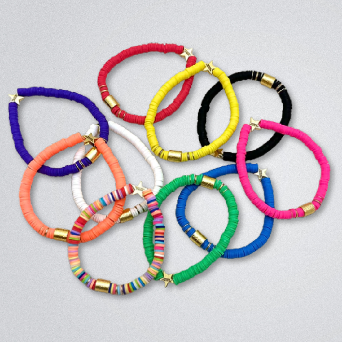 Broadway Stacks rainbow colors elastic stretch bracelets with gold color accents. Star logo bead to remind you that You Shine. Available in red pink orange yellow green blue purple white black and mulit-color. TKTS Steps.