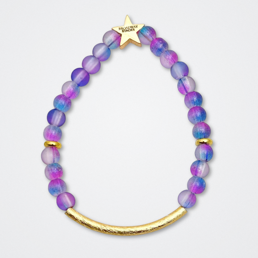 Broadway Stacks QUEEN collection. Stretch bracelets included in Stack. Gold, yellow, green, white, red, pink and blue colored beads. Letter beads that spell each queen. Also Herstory collection. Broadway Stacks gold star logo bead to remind you that You Shine. SIX the Musical fans.