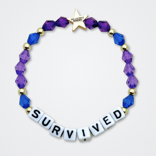 Broadway Stacks QUEEN collection. Stretch bracelets included in Stack. Gold, yellow, green, white, red, pink and blue colored beads. Letter beads that spell each queen. Also Herstory collection. Broadway Stacks gold star logo bead to remind you that You Shine. SIX the Musical fans.