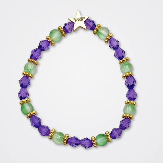 Broadway Stacks QUEEN collection. Stretch bracelets included in Stack. Gold, yellow, green, white, red, pink and blue colored beads. Letter beads that spell each queen. Also Herstory collection. Broadway Stacks gold star logo bead to remind you that You Shine. SIX the Musical fans.