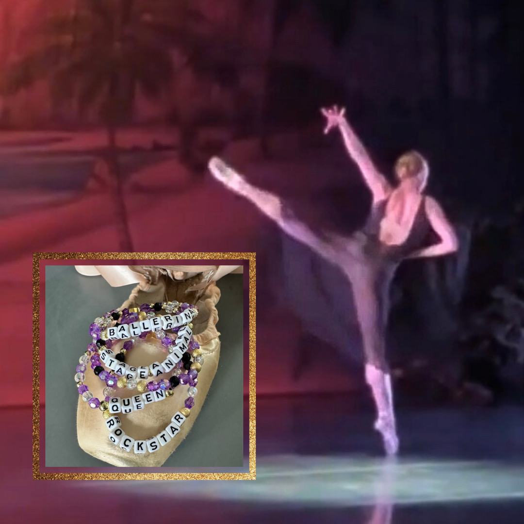 Broadway Stacks Special Edition Sara Mearns ROCKSTAR Bracelet Collection. 5 stretch bracelets included in Stack. Purple, clear, white, black and gold colored beads. Letter beads that spell quotes. Gold star logo bead to remind you that you shine. Sara Mearns and Ballet fans.