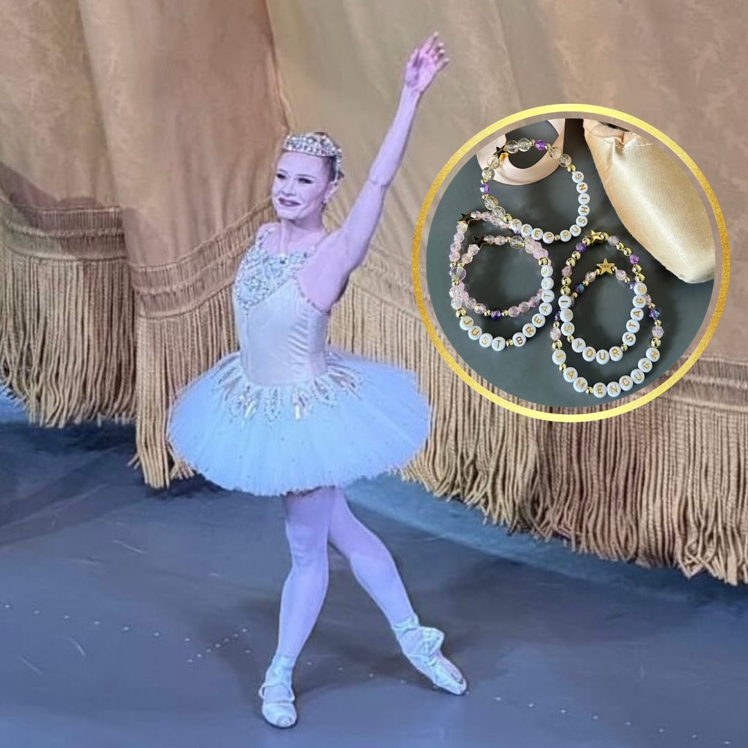 Broadway Stacks Special Edition Sara Mearns STAGE Bracelet Collection. 5 stretch bracelets included in Stack. Purple, pink, clear, white, glitter and gold colored beads. Letter beads that spell quotes. Gold star logo bead to remind you that you shine. Sara Mearns NYCB Principal Dancer and Ballet fans.