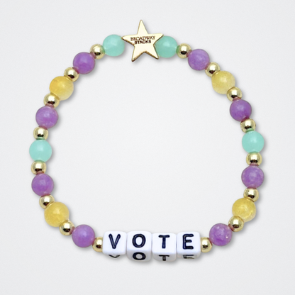 Broadway Stacks CAMPAIGN Collection. 5 stretch bracelets included in Stack. Purple, yellow, teal and gold colored beads. Letter beads that spell quotes. Gold star logo bead to remind you that you shine. Suffs fans. 