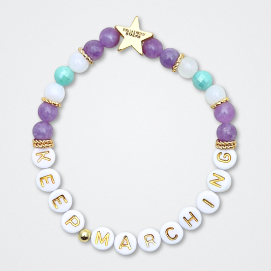 Broadway Stacks CAMPAIGN Collection. 5 stretch bracelets included in Stack. Purple, yellow, teal and gold colored beads. Letter beads that spell quotes. Gold star logo bead to remind you that you shine. Suffs fans. 