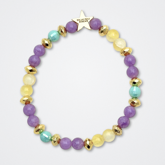 Broadway Stacks CAMPAIGN Collection. 5 stretch bracelets included in Stack. Purple, yellow, teal and gold colored beads. Letter beads that spell quotes. Gold star logo bead to remind you that you shine. Suffs fans. 