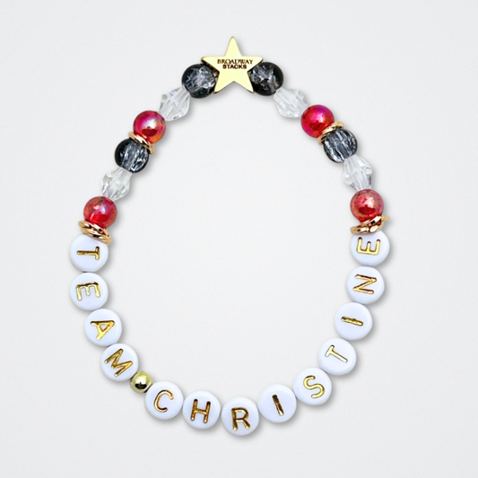 Broadway Stacks MASK collection. Bead bracelets included in Stack. Red, black, white and gold colored beads. Letter beads that spell quotes. Team Phantom, Team Christine, Team Raoul. Gold star logo bead to remind you that You Shine. Phantom of the Opera and Masquerade fans.
