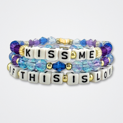 Broadway Stacks theatre-themed bracelet stack inspired by The Notebook Musical. Quotes on bracelets with blue and purple beads on a gray background. Part of the My DAYS Collection.