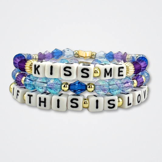 Broadway Stacks theatre-themed bracelet stack inspired by The Notebook Musical. Quotes on bracelets with blue and purple beads on a gray background. Part of the My DAYS Collection.