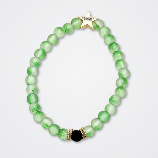 Broadway Stacks WITCH collection. 3 stretch bracelets included in Stack. Greens, pinks, black and gold colored beads. Letter beads that spell quotes. Gold star logo bead to remind you that You Shine. Wicked fans.