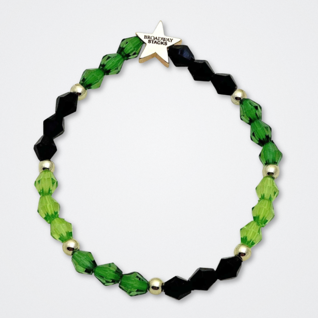 Broadway Stacks WITCH collection. 3 stretch bracelets included in Stack. Greens, pinks, black and gold colored beads. Letter beads that spell quotes. Gold star logo bead to remind you that You Shine. Wicked fans.