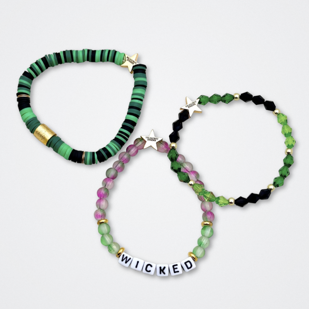 Broadway Stacks WITCH collection. 3 stretch bracelets included in Stack. Greens, pinks, black and gold colored beads. Letter beads that spell quotes. Gold star logo bead to remind you that You Shine. Wicked fans.