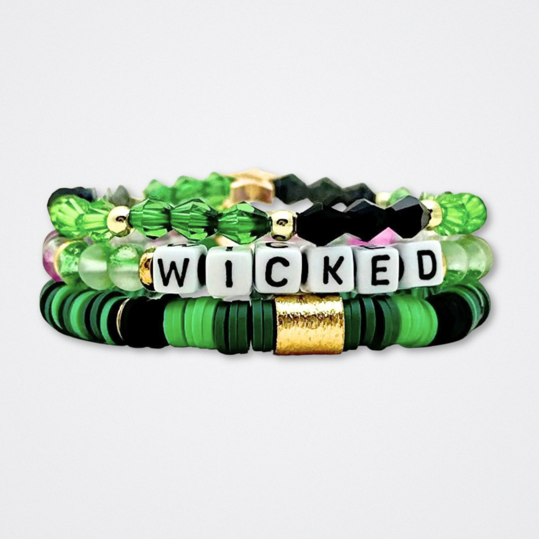 Broadway Stacks WITCH collection. 3 stretch bracelets included in Stack. Greens, pinks, black and gold colored beads. Letter beads that spell quotes. Gold star logo bead to remind you that You Shine. Wicked fans.