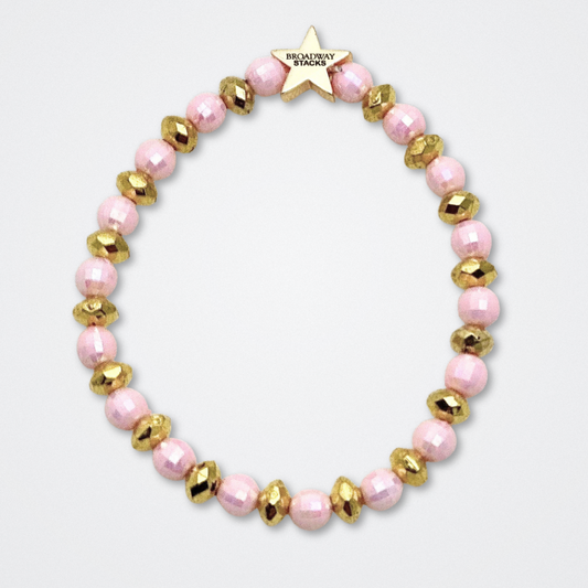 Broadway Stacks WITCH collection. 3 stretch bracelets included in Stack. Greens, pinks, black and gold colored beads. Letter beads that spell quotes. Gold star logo bead to remind you that You Shine. Wicked fans.