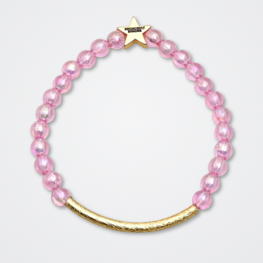 Broadway Stacks WITCH collection. 3 stretch bracelets included in Stack. Greens, pinks, black and gold colored beads. Letter beads that spell quotes. Gold star logo bead to remind you that You Shine. Wicked fans.
