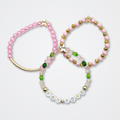 Broadway Stacks WITCH collection. 3 stretch bracelets included in Stack. Greens, pinks, black and gold colored beads. Letter beads that spell quotes. Gold star logo bead to remind you that You Shine. Wicked fans.