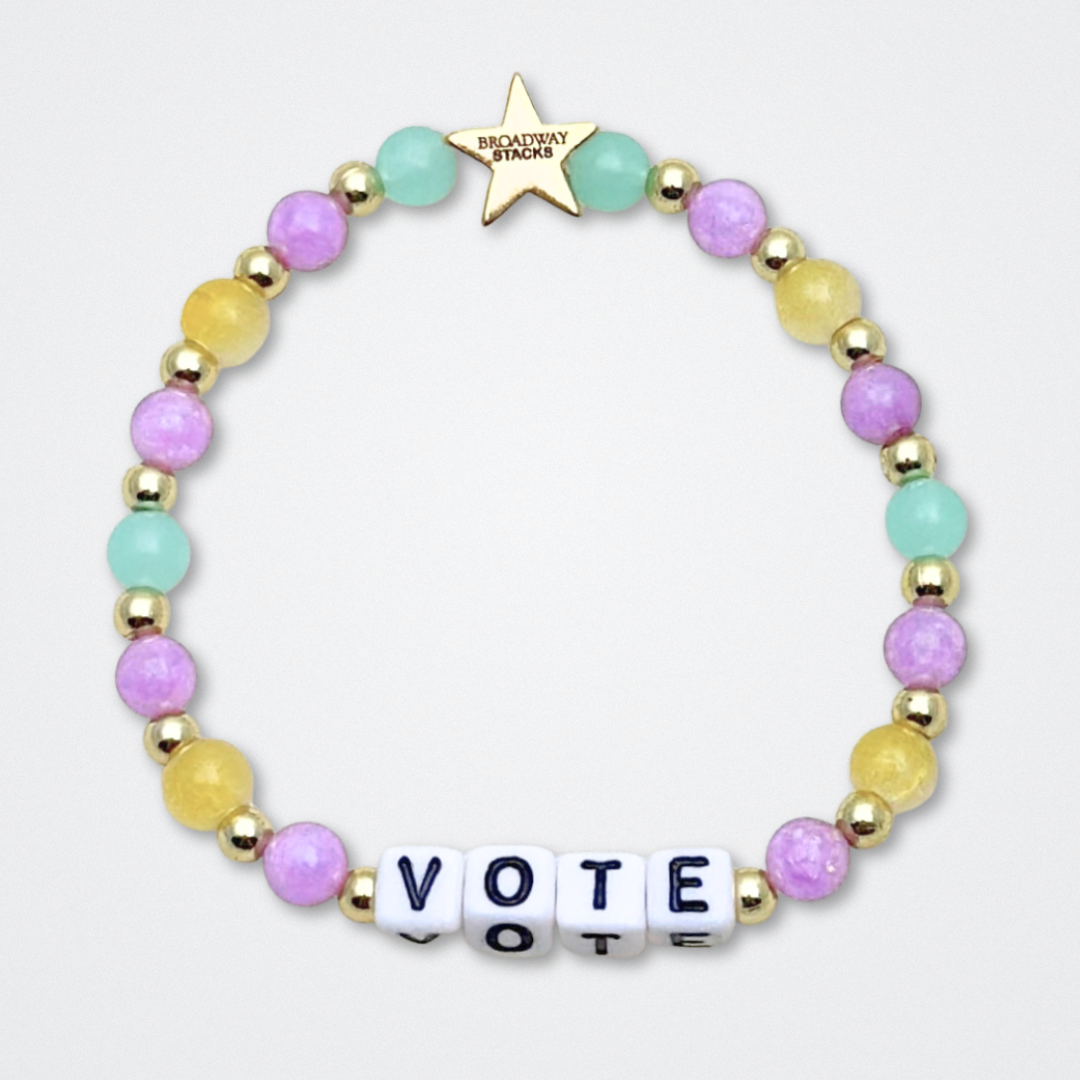 Broadway Stacks CAMPAIGN Collection. 5 stretch bracelets included in Stack. Purple, yellow, teal and gold colored beads. Letter beads that spell quotes. Gold star logo bead to remind you that you shine. Suffs fans. 